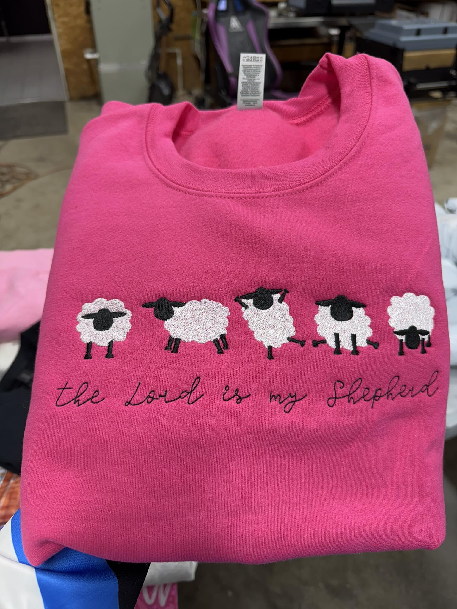 Pink sweatshirt with sheep design and &