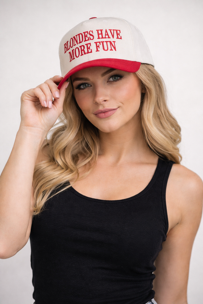 Woman wearing a cap with &
